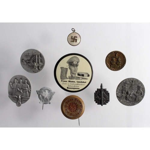 570 - German Nazi interest a small selection of various Day Badges inc Labour Day, Worker Day, a wooden ve... 