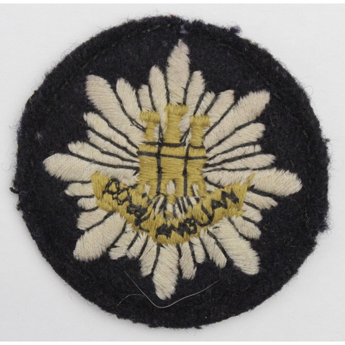 902 - Royal Anglians 1st Bn cloth Ski cap badge