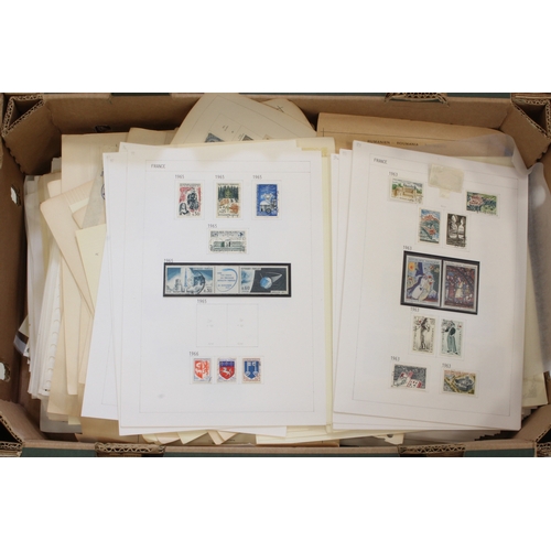 2784 - Large tray of stamps on leaves - mostly foreign. Useful items seen and worth a good look.  (Buyer co... 