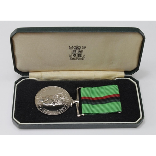 1651 - Royal Ulster Constabulary Service Medal to (R/Const C C C Brownless). (1st type ribbon) in Royal Min... 