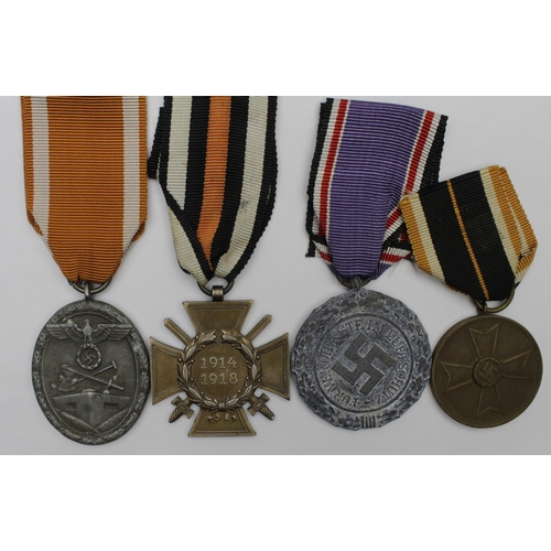 1741 - German Luftschutz Medal, West Wall Medal, War Merit Medal and WW1 Cross of Honour.