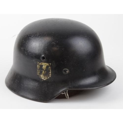 1811 - German SS single decal helmet complete with lining and chin strap with owners details written on the... 