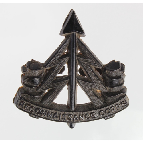 1055 - WW2 Plastic economy Issue Reconnaissance Corps Cap Badge.