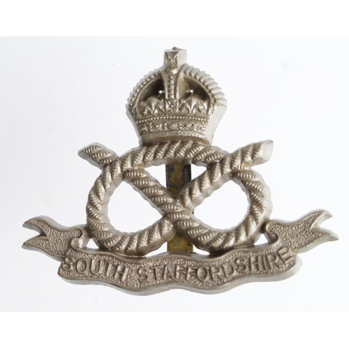 112 - Badge South Staffordshire Regiment WW2 plastic economy hat badge complete with fixing lugs.