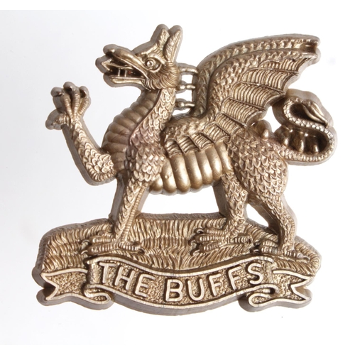 114 - Badge The Buffs Regiment WW2 plastic economy hat badge complete with fixing lugs.