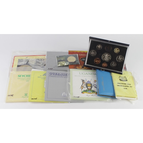 2617 - World BU Coins & Sets: 11 presentation packs, and a Guernsey proof set 1986.