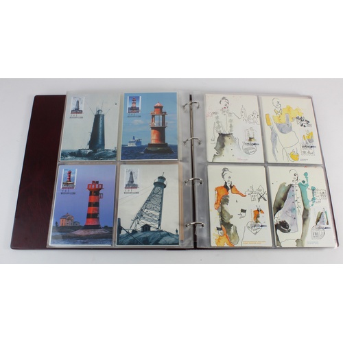 2905 - Aland post office stamped postcards & maxim cards (approx 145) in binder.  VGC