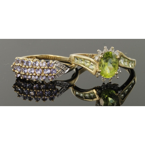 495 - 9ct peridot and diamond cluster ring, finger size Q, weight 2.4g. 9ct yellow gold tanzanite three ro... 