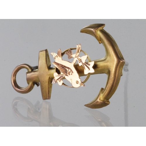 63 - 9ct yellow gold anchor brooch with rose gold dove, weight 1.1g