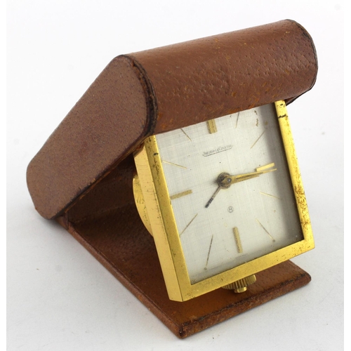 141 - Jaeger LeCoultre travel clock, contained in a leather case, diameter 70mm approx. (working at time o... 