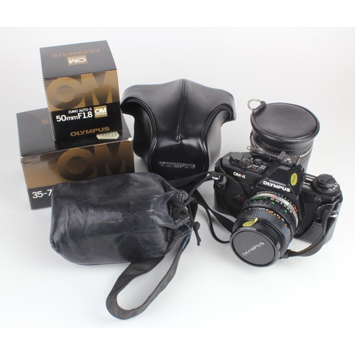 417 - Olympus OM 4 camera, with Zuiko auto-s 35-70mm lens, in original case, together with two other lense... 