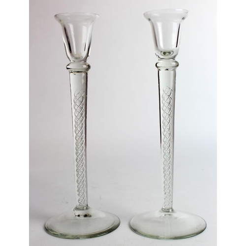 419 - Pair of glass candlesticks with twist stems, height 24.5cm approx.