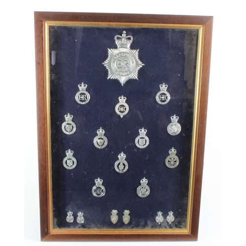 423 - Police badges. A collection of nineteen police badges, including Metropolitan, H.M. Prisons, Cheshir... 