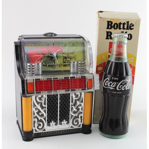 435 - Two novelty items, Juke-box clock and Coca-Cola radio. Clock working but radio needs attention; radi... 