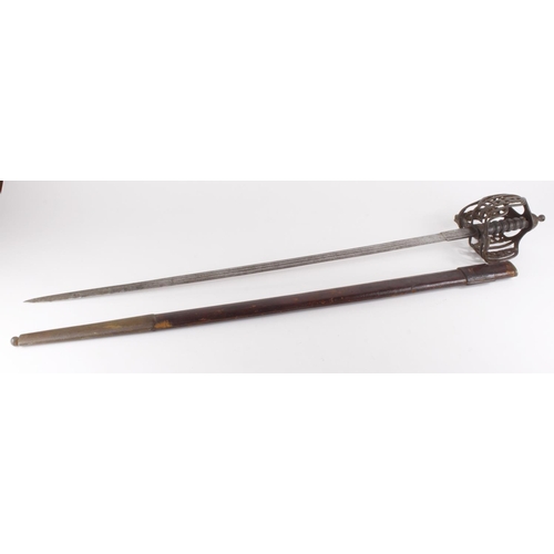 1181 - Sword Scottish late Victorian Officers basket hilt sword in its leather field scabbard.