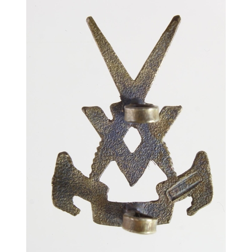 1495 - Badge a Far East V Force cap badge, local sand cast made