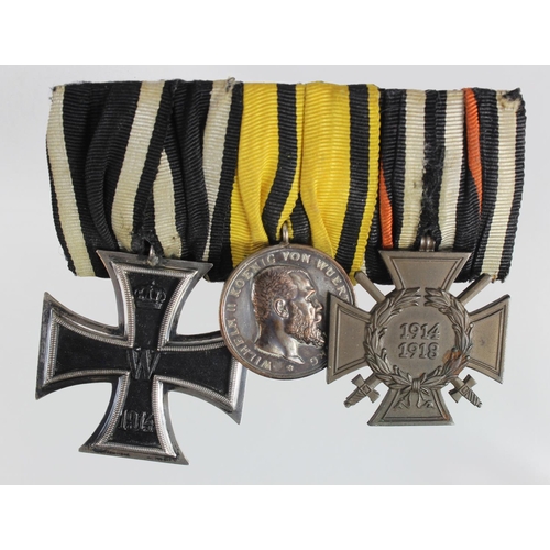 1873 - German Iron Cross 2nd Class WW1, Wurttemberg Military Merit Medal, and Honour Cross with Swords make... 