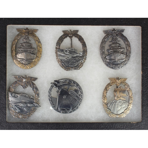 1943 - German Nazi Naval badges various x6 in a display case