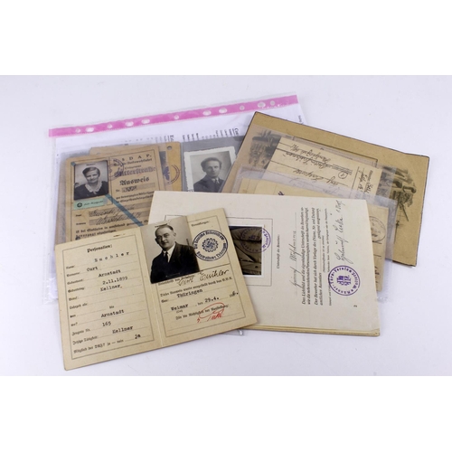 2411 - WW2 German Documents some with pictures of recipients together with Stalag X-B Guards Card dated Jul... 