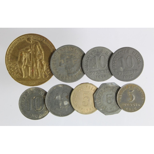 303 - Germany (9) late and post WWI coins and Kriegsgeld, and a brass medal similar theme.