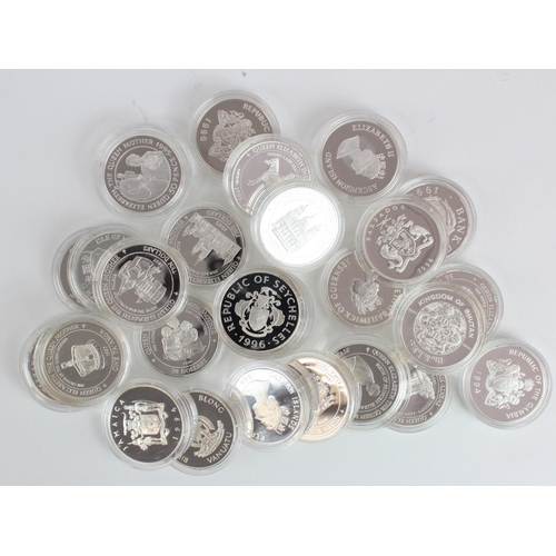 564 - World Silver Proofs (26) All Crown size and with a Royalty theme. aFDC/FDC in hard plastic capsules