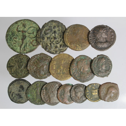 74 - Various ancient coins, all struck in bronze, Roman 13, Roman Colonial 1, Byzantine 2, NF to VF [16]