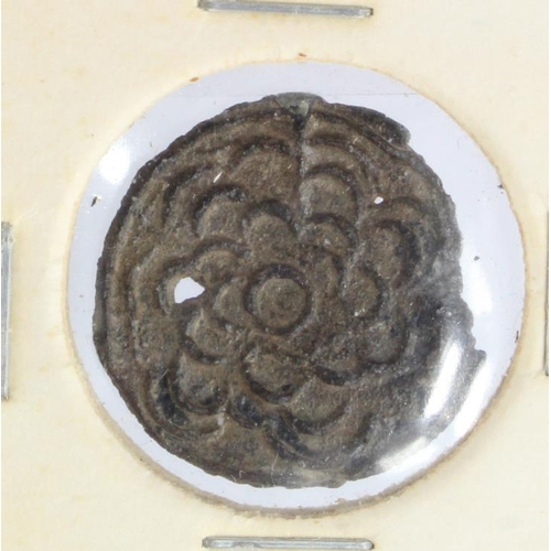 883 - Brunei anon. 18th-19thC tin 'flower' coin d.21.5mm, nVF with some chipping, holed as usual.