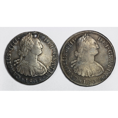 997 - Spanish Bolivia (2) silver 8 Reales: 1802 PTS PP KM# 73 porous GF, and 1808 PTS PJ VF holed.