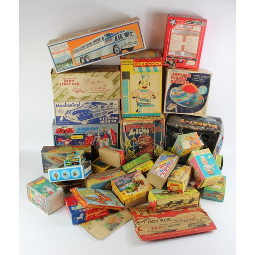 103 - Toy boxes. A collection of approximately twenty-five empty original and reproduction cardboard boxes... 