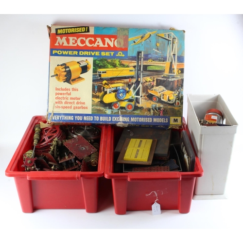 82 - Meccano. A large quantity of old Meccano contained in three crates & a boxed set (incomplete)