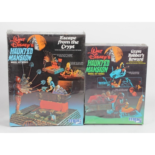 87 - MPC. Two Walt Disney Haunted Mansion model kits, by MPC, comprising Haunted Mansion (no. 1-5050) & E... 