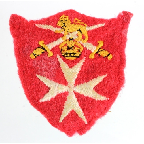 1130 - Cloth badge - British Army Officer rank insignia with Maltese Cross below