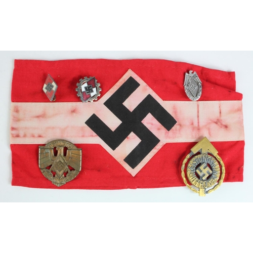 1221 - German Hitler Youth armband with assortment of attached HJ badges.