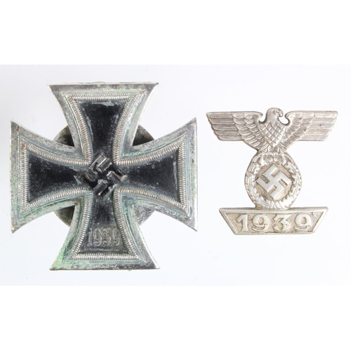 1225 - German Iron Cross 1st class screw back, a solid one piece example plus a spange 2nd class