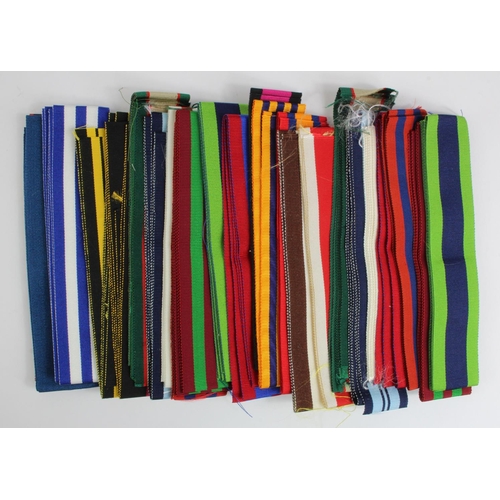 1418 - Medal ribbon, 6 inch lengths of assorted full size British and Commonwealth medals. EF. (approx 100... 