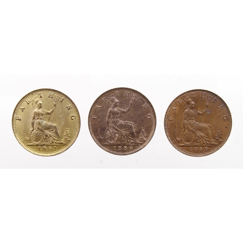 144 - Farthings (3): 1880 EF, 1881 3 berries, hooked nose, Freeman 546 R2, gilt EF, and 1884 UNC