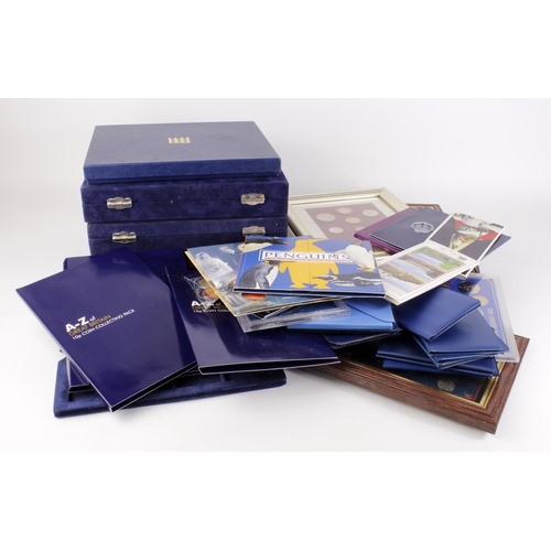 495 - GB & Commonwealth commemorative coins, sets, and accessories in a bag and stacker box.