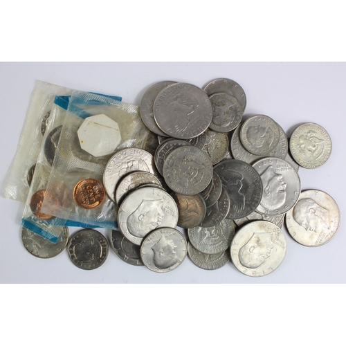 661 - USA (49) 20thC, a little silver noted, mostly base metal including 'moon dollars'.