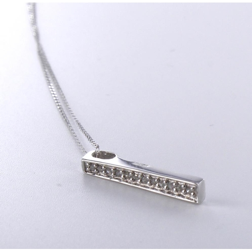 40 - 9ct white gold slightly flared bar pendant set with twelve round diamonds totalling approx. 0.10ct, ... 