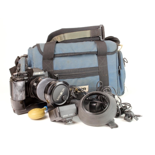 645 - Minolta 9000 camera, with a quantity of accessories, in a carrying case