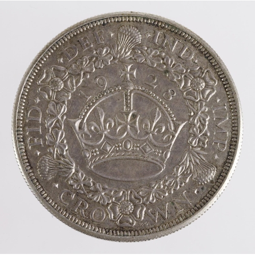 103 - Crown 1928 wreath, toned GVF, scratches obv.