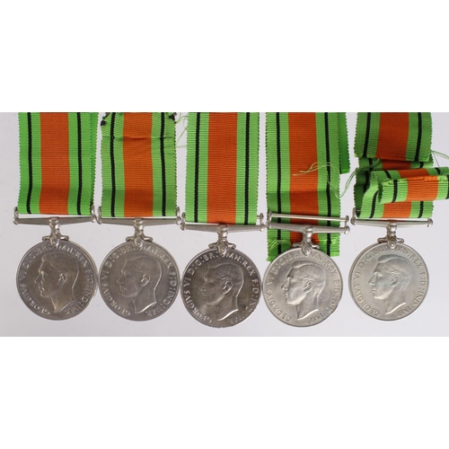 2310 - WW2, 5x boxed Defence Medals in separate boxes to various recipients