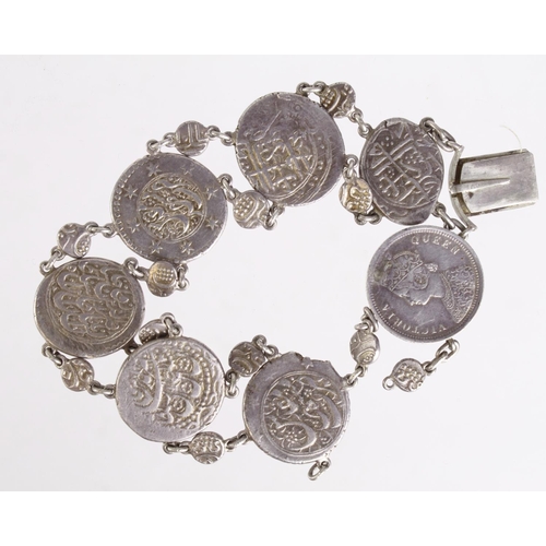 774 - Coin Bracelet, silver/white metal 22mm, set with Indian states silver 'half rupees', minors, and a 1... 