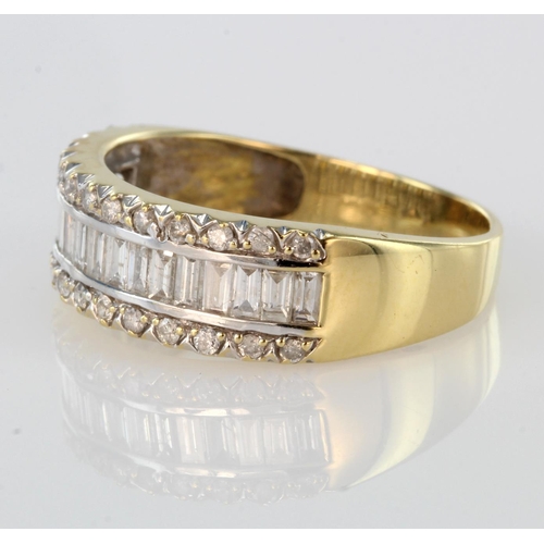 15 - 18ct yellow gold band ring set with row of baguette cut diamonds bordered by a row of round diamonds... 