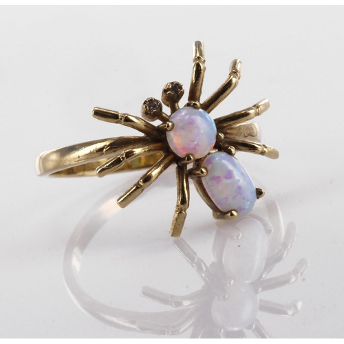 52 - 9ct yellow gold spider ring set with two opal cabochon stones and diamond eyes, finger size O, weigh... 