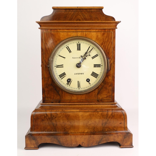 522 - Large walnut cased mantel clock, enamel dial with Roman numerals, reads 'Camerer Kuss & Co., London'... 