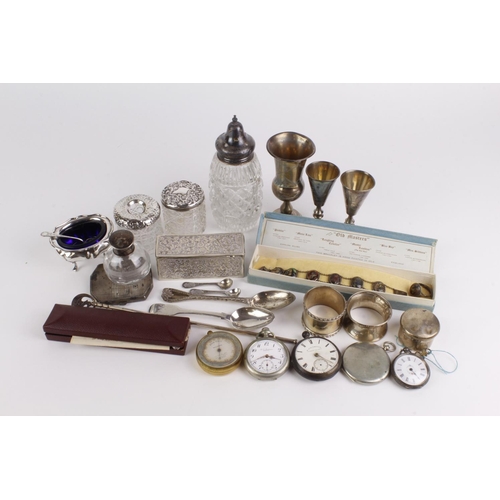 595 - Mixed silver. A collection of mixed silver & white metal, including spoons, powder compact, white me... 