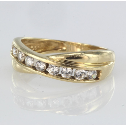 84 - 9ct yellow gold band ring with channel set cz, finger size M, weight 2.7g