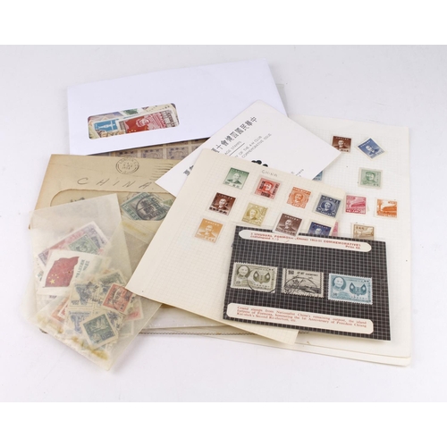 93 - China, selection of stamps on leaves, in packets, loose, etc. Includes some large mint multiples.