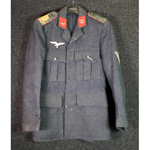 1454 - German Luftwaffe airmans jacket complete with some insignia. Sadly the jacket has moth damage. Sold... 